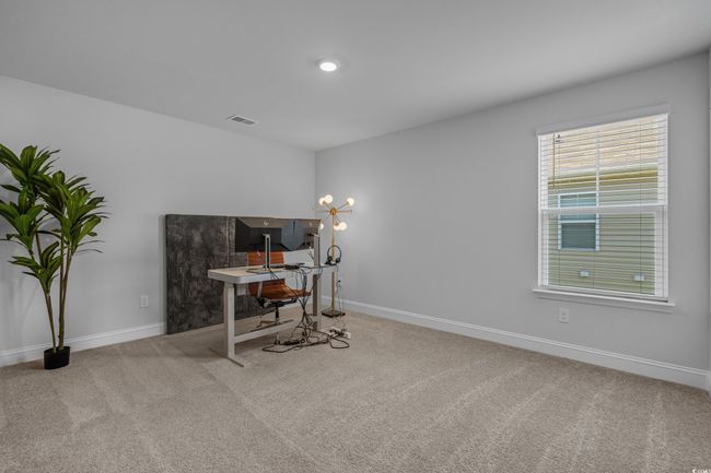 Carpeted office featuring baseboards | Image 32