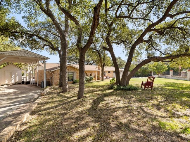 View from the left front of the lot just inside the gate. Carport on the left will accomodate a motor home. | Image 18