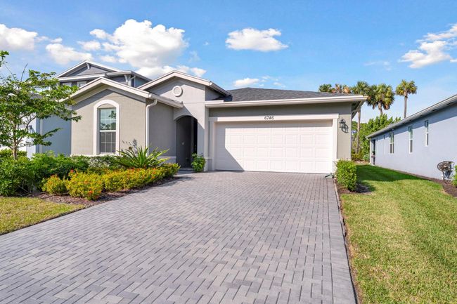 6746 Pointe Of Woods Drive, House other with 3 bedrooms, 2 bathrooms and null parking in West Palm Beach FL | Image 2