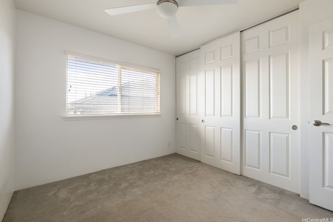 The 2nd bedroom upstairs has plenty of closet storage. | Image 17