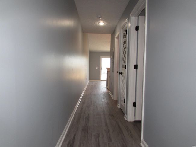Entry hall with LVP flooring. | Image 11