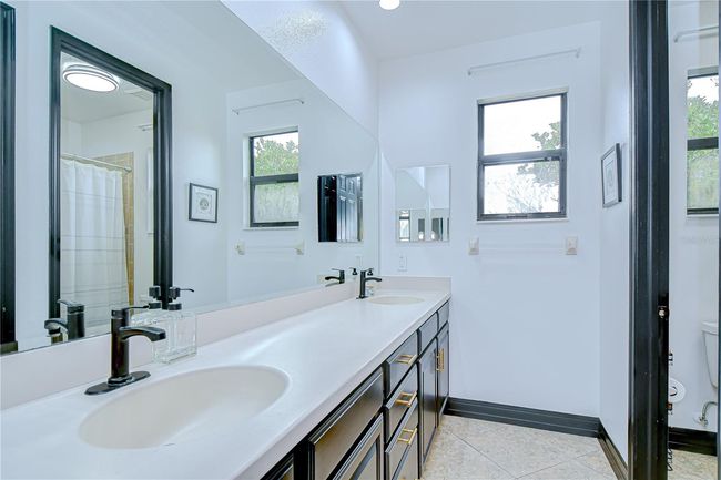 Bathroom with dual sinks! | Image 26