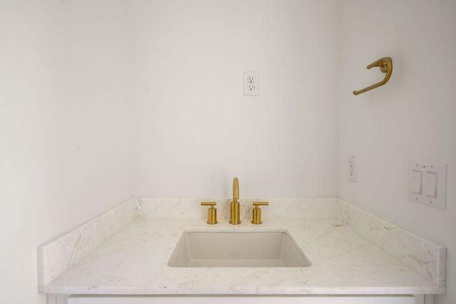 Bathroom featuring a sink | Image 17