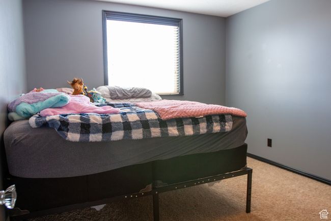 Bedroom with carpet, large closet | Image 17