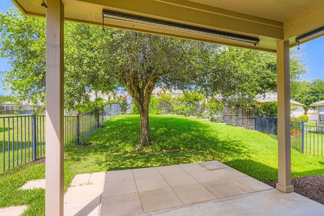 Fenced backyard featuring a patio | Image 31