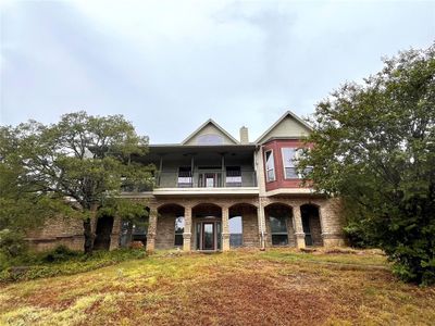 View of front of house with a balcony | Image 3