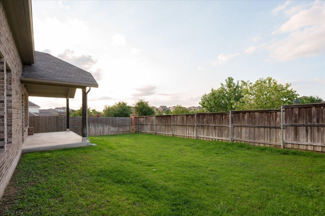 View of yard with a patio | Image 32