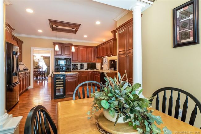 The breakfast nook measures 9' x 8'. | Image 11