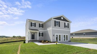 View of front of house featuring a front lawn and a patio area | Image 3