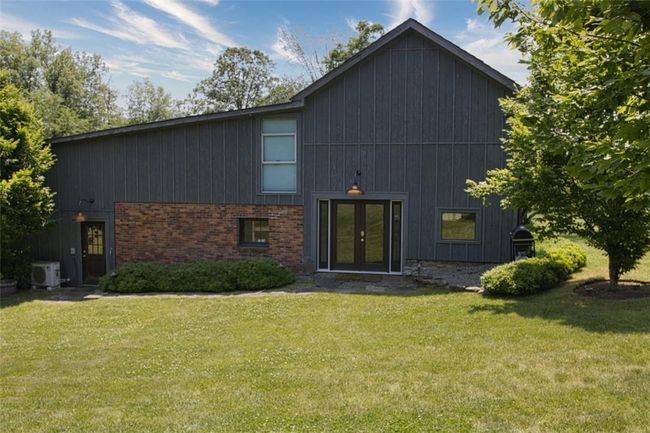 Barn with two bays and entertainment room, wine cellar closet, exercise room above and full bath | Image 33