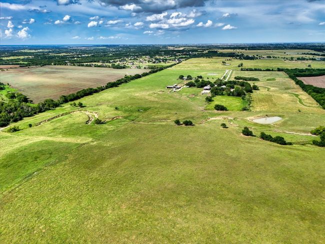 Aerial overview of property's location with rural landscape | Image 27