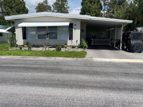 63 Royal Palm Cir, LARGO, FL, 33778-1300 | Card Image