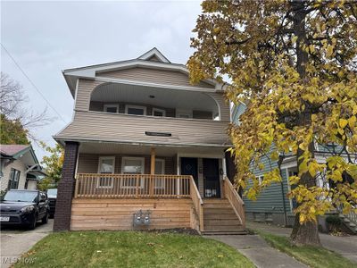 View of front of house with a balcony and covered porch | Image 2