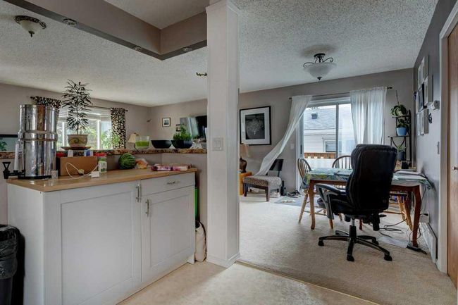 127 Millcrest Way Sw, Home with 4 bedrooms, 2 bathrooms and 2 parking in Calgary AB | Image 9