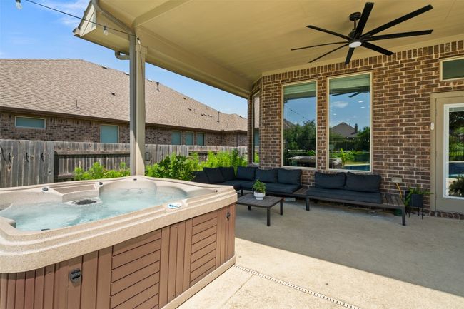 Covered patio, spa and pool make this the perfect yard year round! | Image 21