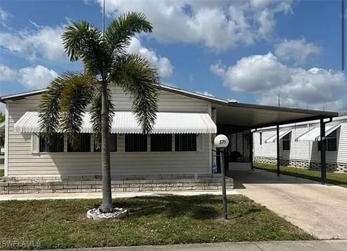 571 Sunrise Ln, NORTH FORT MYERS, FL, 33903-7617 | Card Image