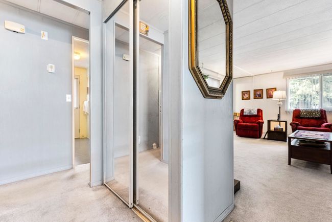 Hall with light colored carpet | Image 5