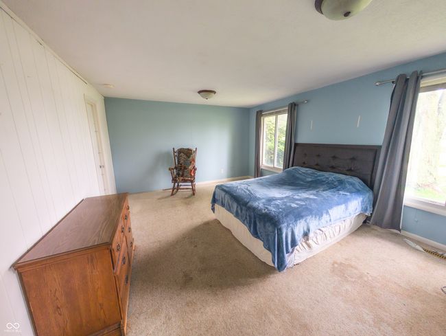 view of carpeted bedroom | Image 15