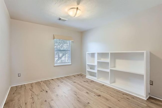 Secondary bedroom #2 - beautiful luxury vinyl flooring installed in 2023 | Image 31