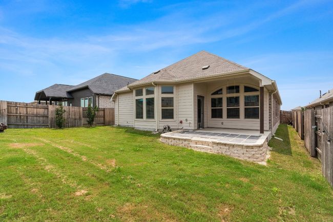 Back of house with a patio and a fenced backyard | Image 23