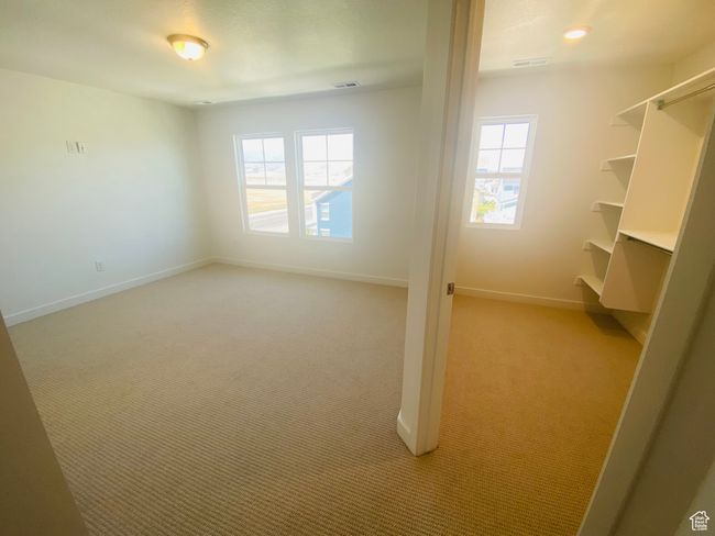 Interior space featuring light carpet | Image 12