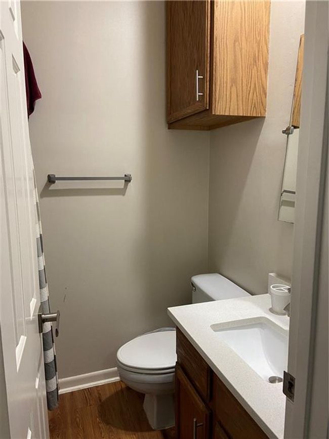 Bathroom featuring wood finished floors and vanity | Image 6