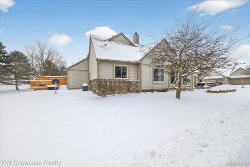802 Red Maple Ln, Wixom, MI, 48393-4527 | Card Image