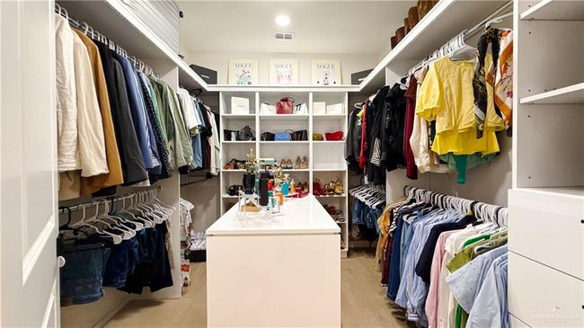View of walk in closet | Image 13