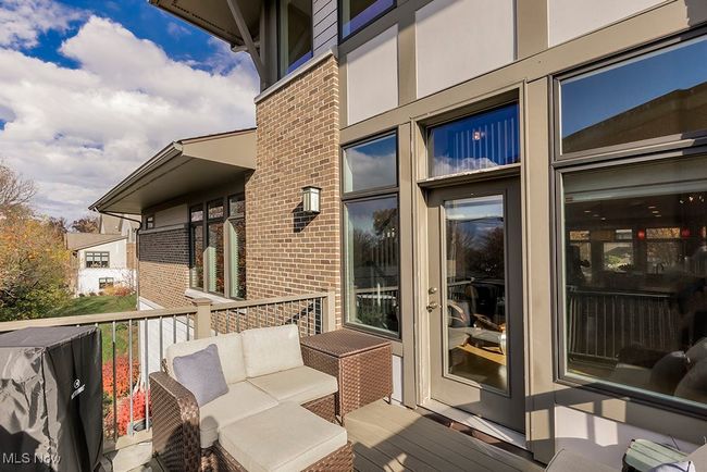 Upstairs deck off family room. | Image 39