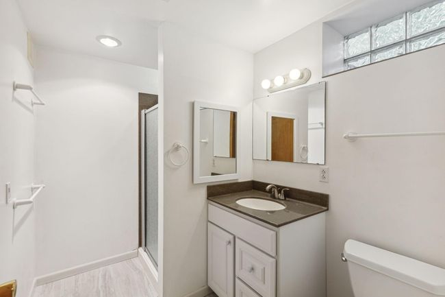 Lower level updated bathroom with tile floor. | Image 29