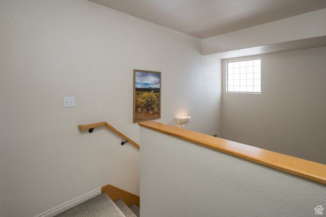 Stairs featuring carpet | Image 24