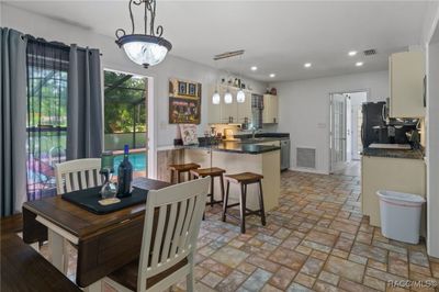 8585 N Pine Needle Terrace, House other with 3 bedrooms, 2 bathrooms and 2 parking in Crystal River FL | Image 3