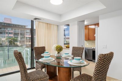 You can dine indoors with cool central AC and a view of tennis court or dine al fresco on your 800 SF lanai right next to the action on the court. | Image 3