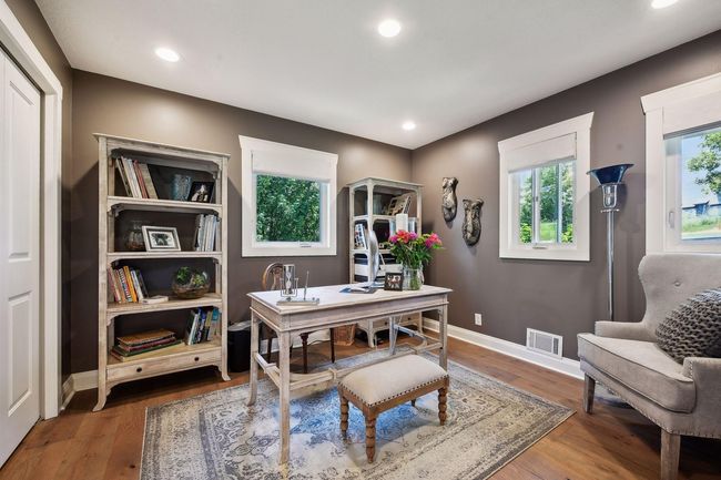 Second bedroom on the main level provides flexibility to the floor plan by easily functioning as an office. | Image 18