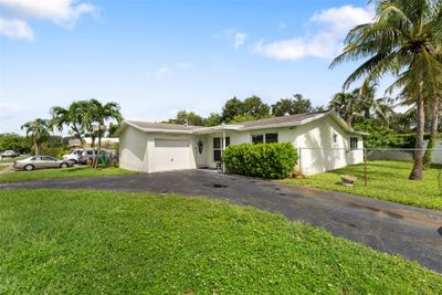 11951 Nw 33rd St, House other with 3 bedrooms, 2 bathrooms and null parking in Sunrise FL | Image 2