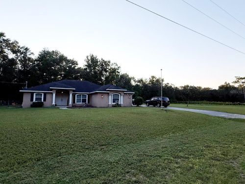 9057 Realstone Dr, Webster, FL, 33597-9407 | Card Image