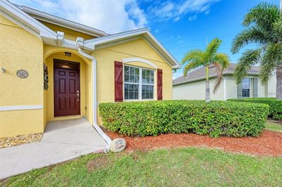 7140 Mikasa Drive, House other with 4 bedrooms, 2 bathrooms and null parking in Punta Gorda FL | Image 2