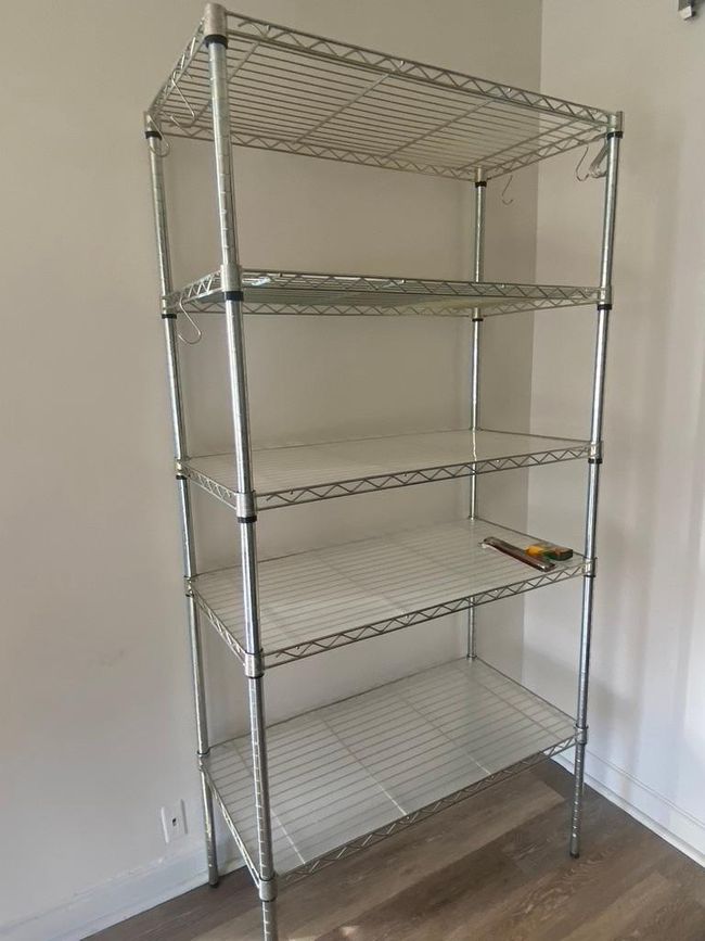 Shelving unit included in sale. | Image 29