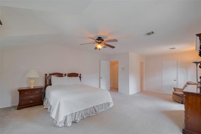 Spacious primary bedroom featuring a generous walk-in closet. | Image 20