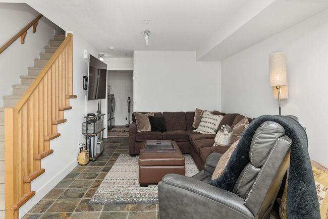 Downstairs recreation area/family room that could be converted to a third bedroom or used as a home business with separate entry | Image 28