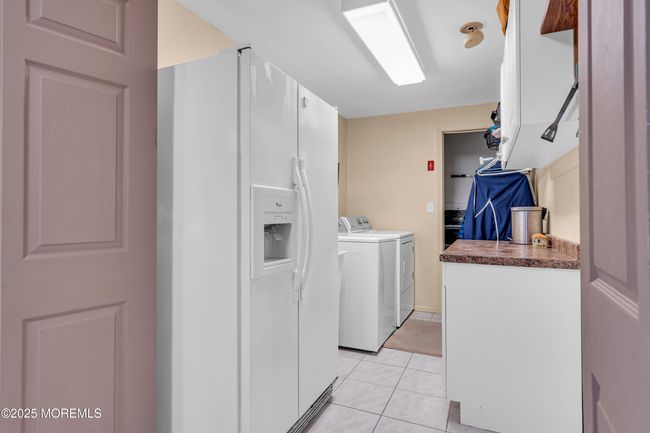 massive laudry room with counterspace | Image 33