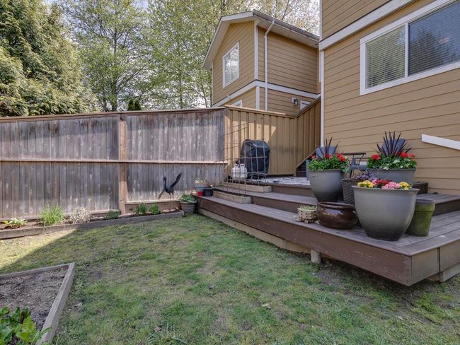View of yard with fence | Image 35
