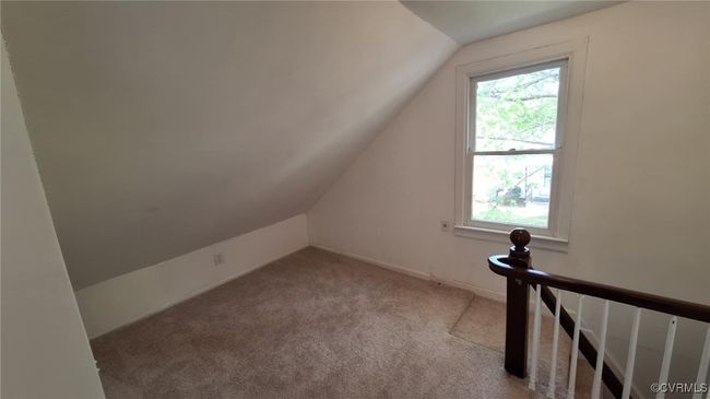 Bonus room with lofted ceiling and carpet floors | Image 27