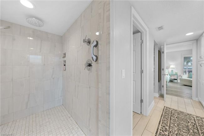 Bathroom with a tile shower | Image 24