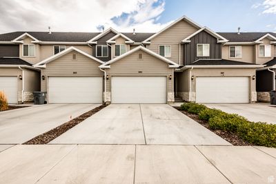 View of front of property featuring a garage | Image 1