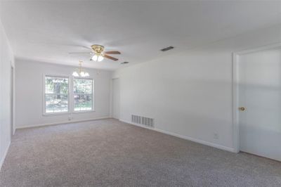 Dining Area overlooking the beautiful oak tree and expansive back yard | Image 2