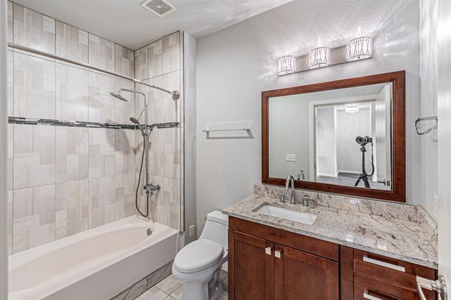 Full bathroom with vanity and shower / bathtub combination | Image 9