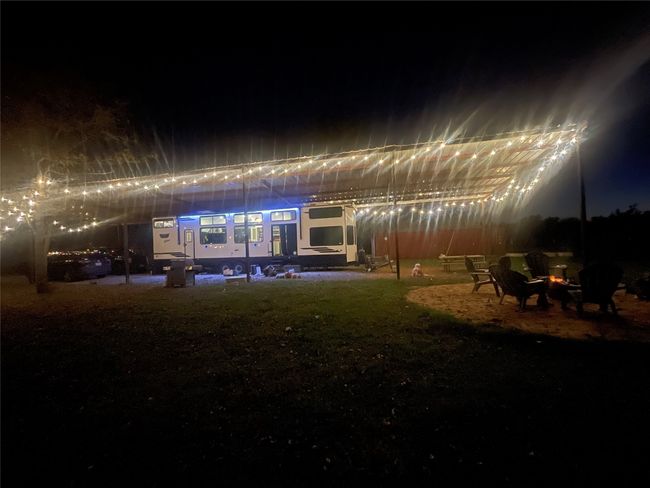 Yard at night with a fire pit | Image 18