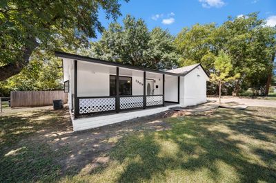 View of front of house with central AC and a front yard | Image 3