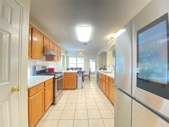 Spacious kitchen, a lot of natural light. Connect With dining room as well as to Breakfast area. | Image 6